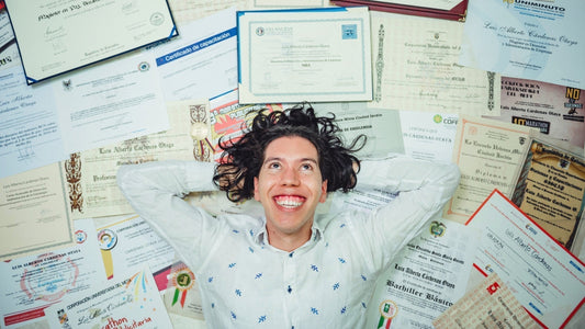 TEFL teacher, surrounded by TEFL/TESOL certificates 